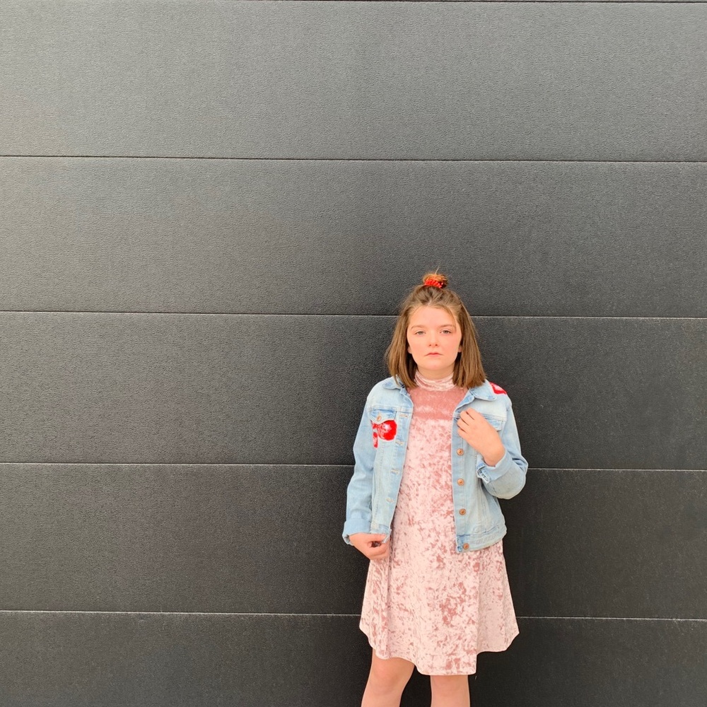 Denim jacket with rose patches